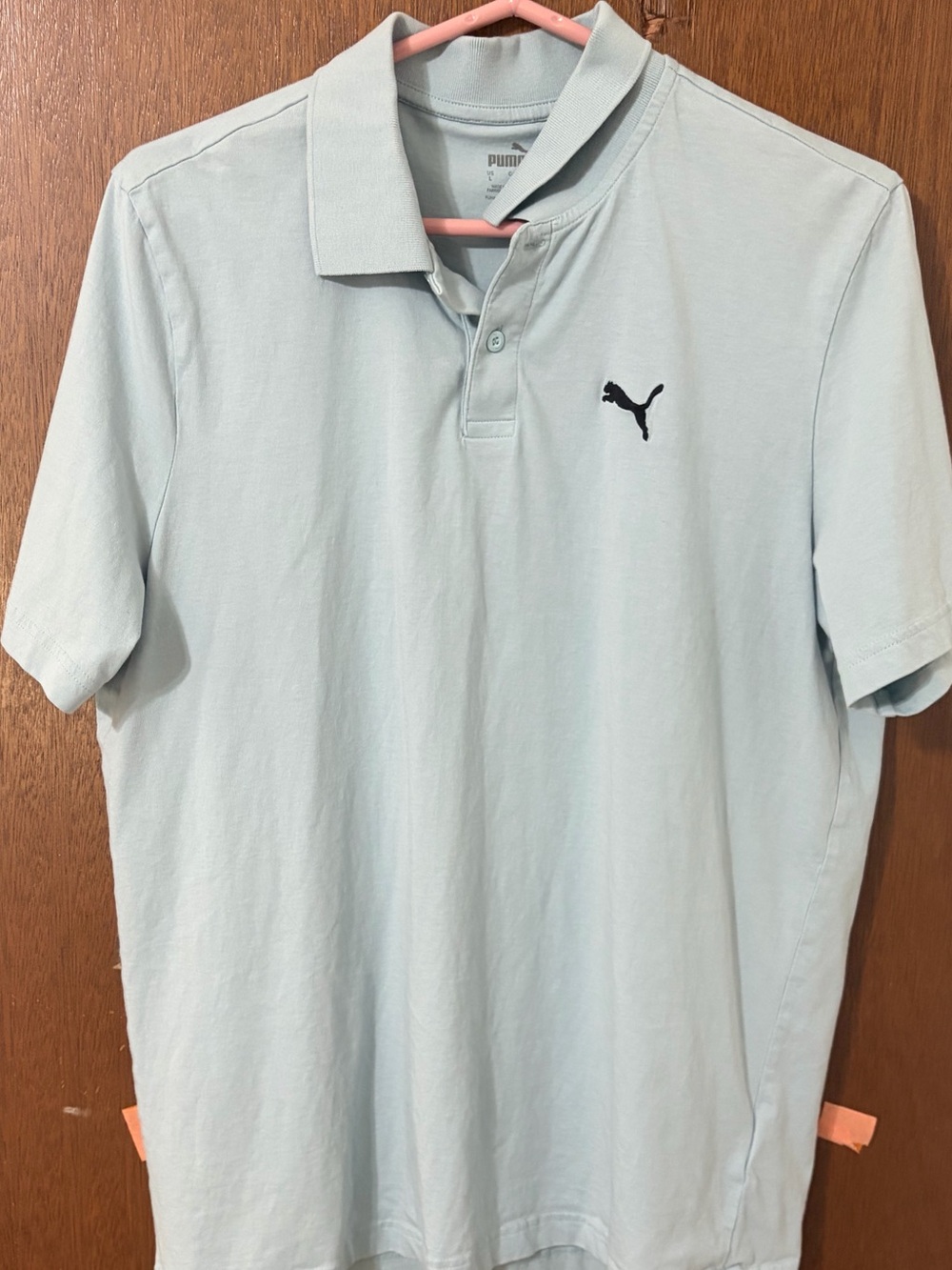 Puma Men's Pale Blue Polo with Black Logo